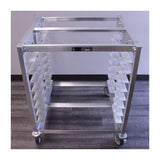Oven pan rack made from aluminum for durability and corrosion-resistance. • Half size design • Pan Capacity: 8 • 29"W x 26L x 34"H 